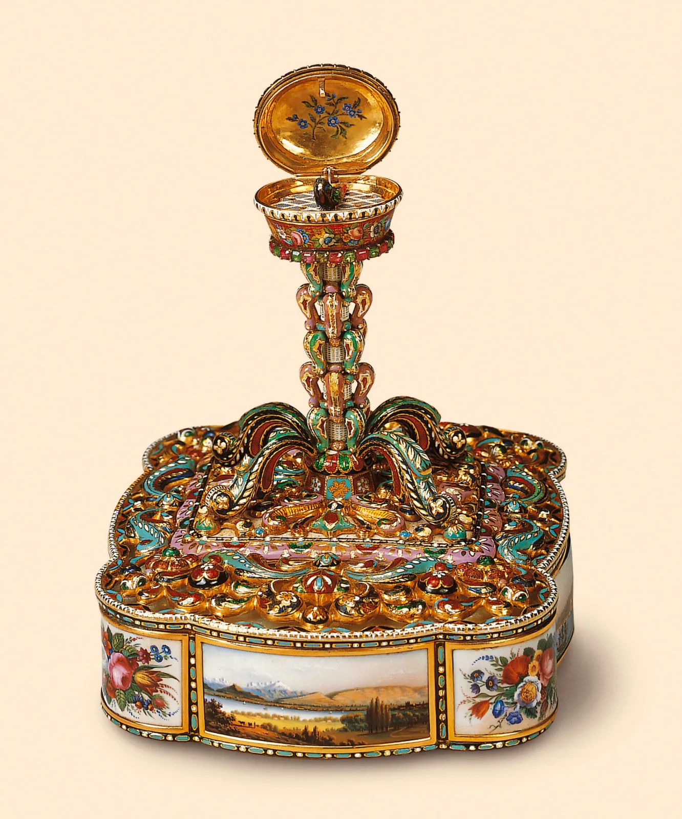Ornate gold singing bird box shaped like a scent flask, encrusted with enamel flowers and set with red and green stones, with a painted enamel landscape panel on its base