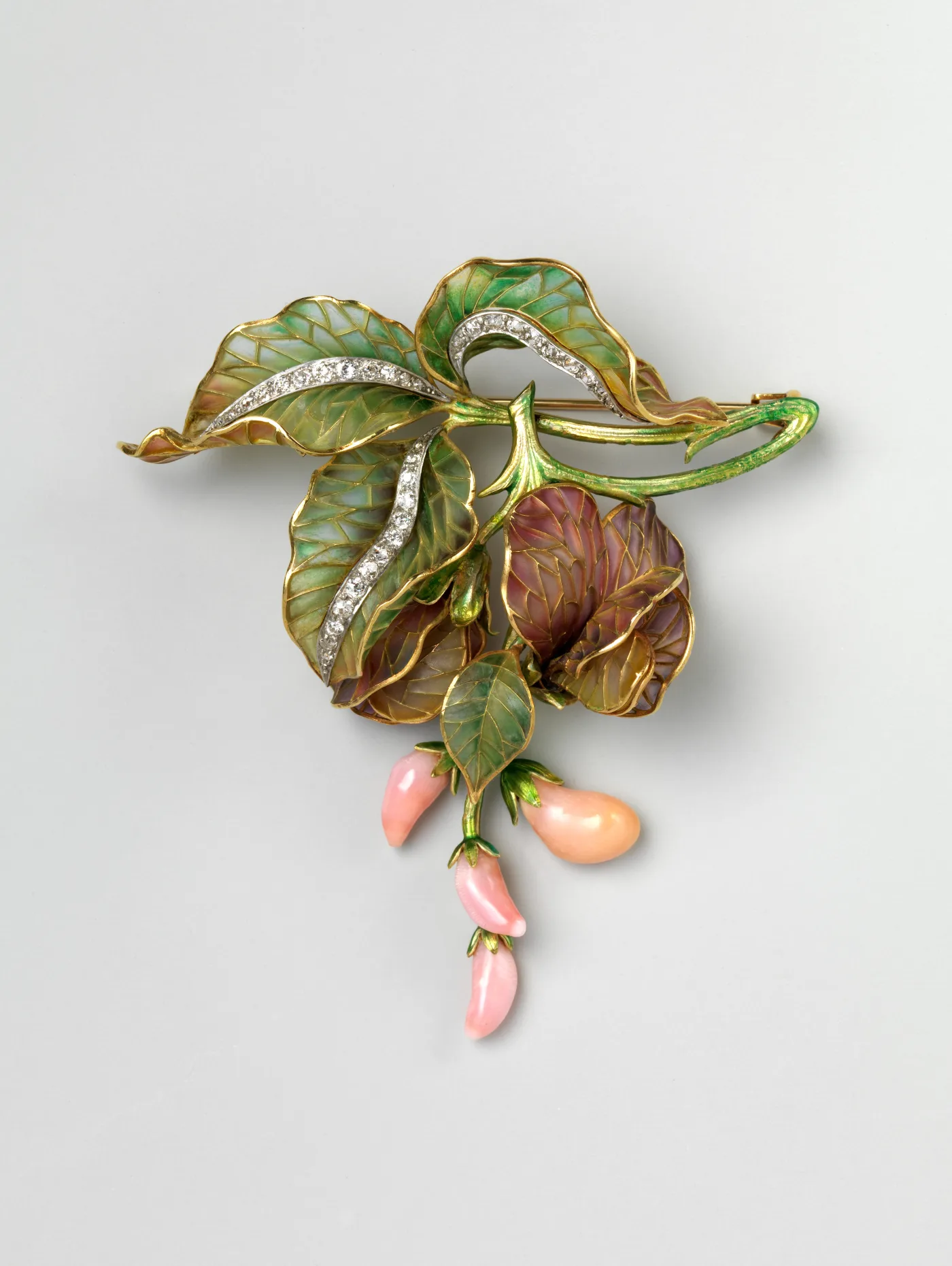 Gold brooch shaped as a sweet pea plant with translucent green and mauve enamel petals, diamond-lined leaf veins and pink pearl buds hanging below