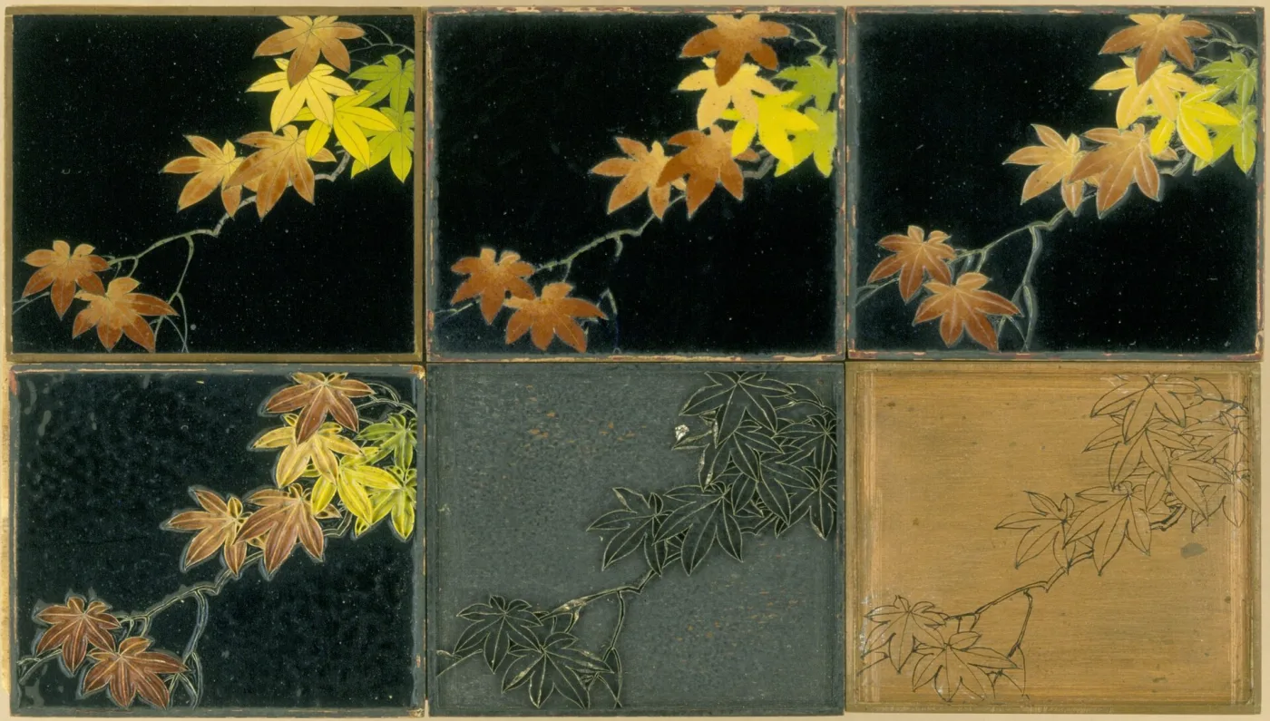 Six small enamel plaques in a fitted set, each carrying the same maple-branch design at a different stage of completion, from a bare copper plate bearing only a line drawing to a glossy mirror-polished panel