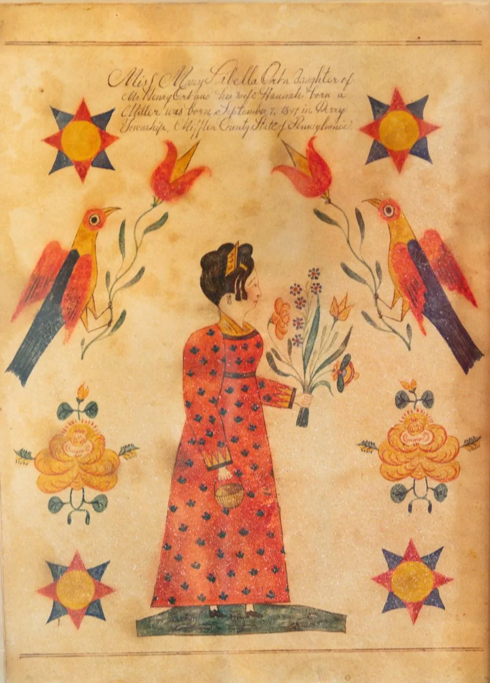 Pennsylvania fraktur drawing of a woman in a long red dress holding flowers, flanked by two parrot-like birds on tulip stems and four eight-pointed stars