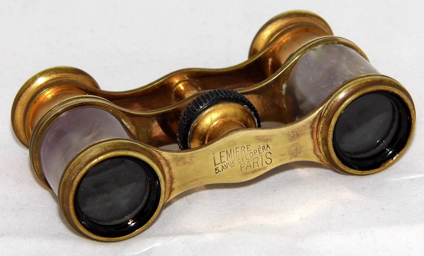 Brass and mother-of-pearl opera glasses with LEMIERE 5 AVUE DE L'OPERA PARIS engraved along the bridge