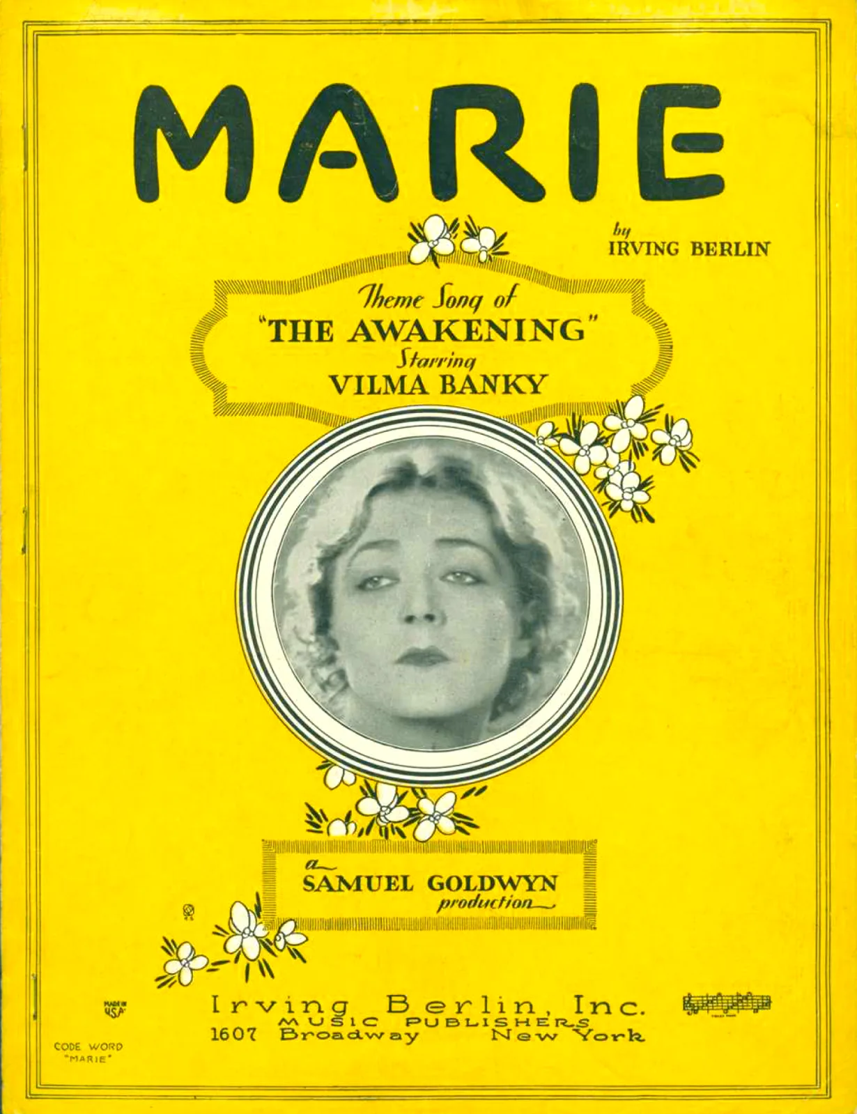 Bright yellow sheet music cover with the title Marie in heavy black lettering above an oval photographic portrait of an actress, with credits and a publisher imprint at the foot