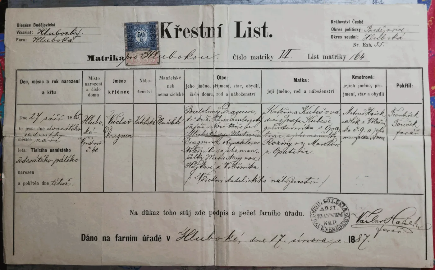 An 1887 printed Czech baptism certificate completed in ink, with a blue and red fifty-kreuzer revenue stamp affixed at the top and cancelled by the parish that issued it