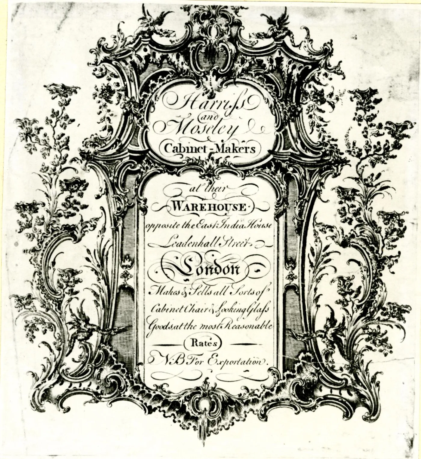 Engraved eighteenth-century London trade card, its text set inside an elaborate rococo frame drawn as a cabinet with scrolled sides and sprays of flowers