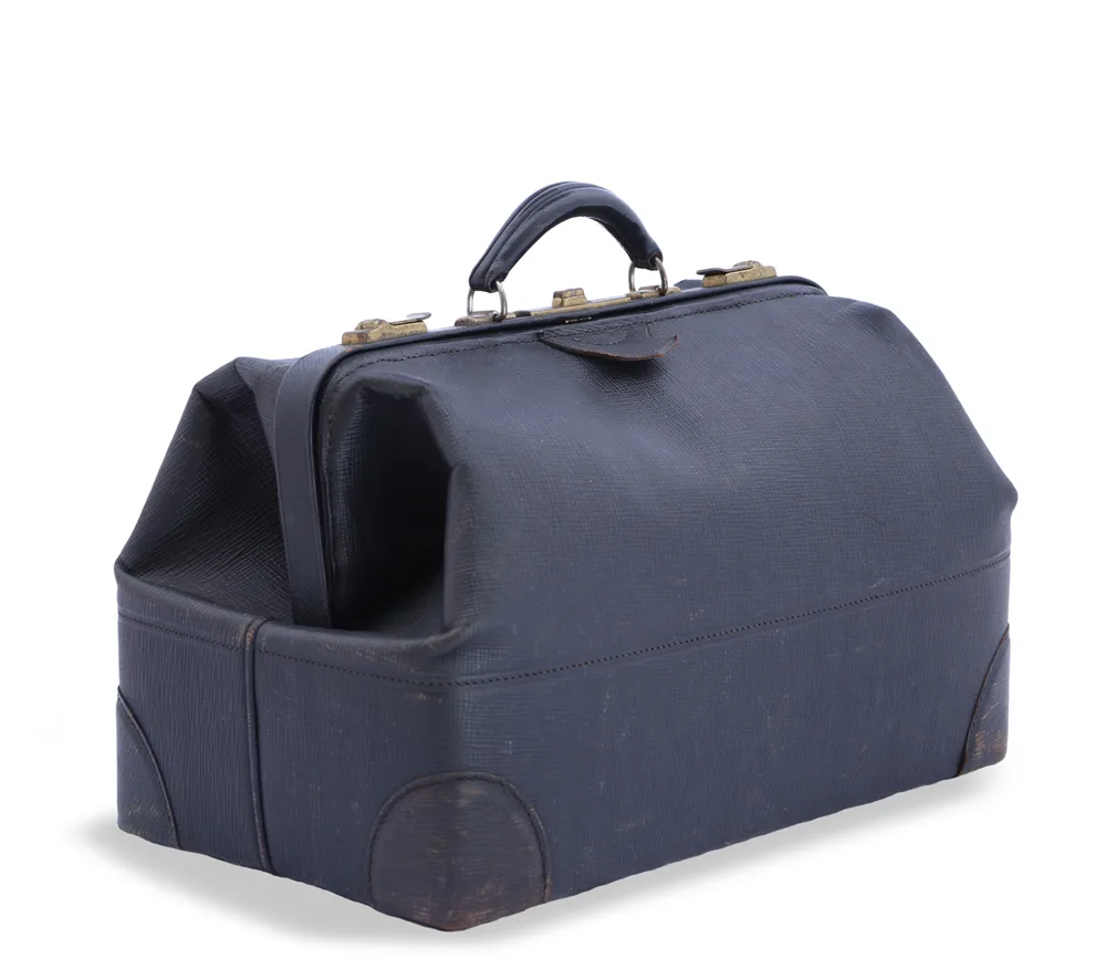 Grained leather doctor's bag in dark blue-grey with a hinged frame mouth, a single arched carrying handle, brass feet and a lock at the centre of the top rail