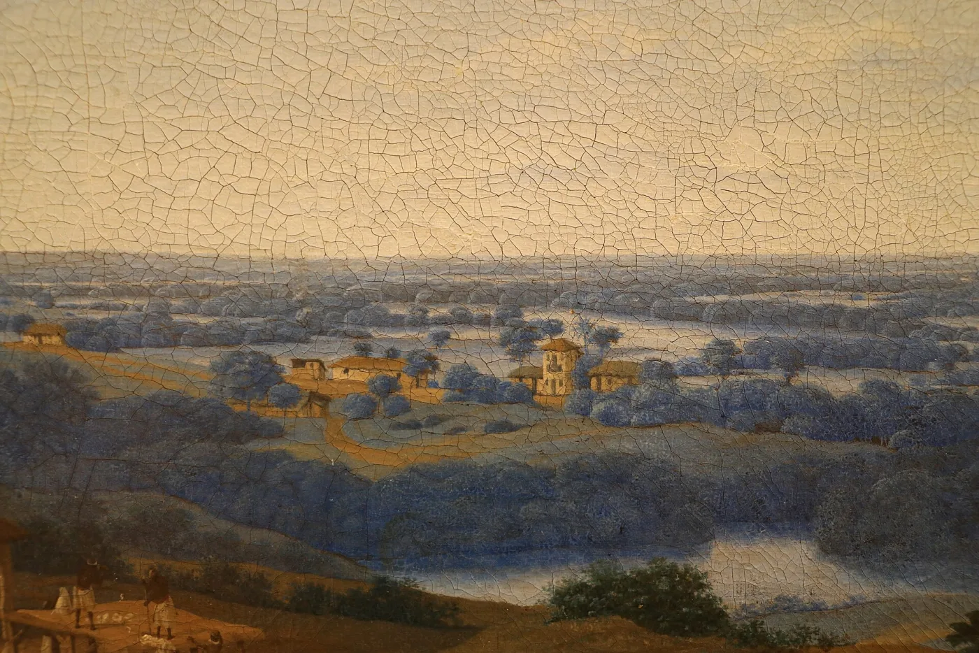 Detail of an oil painting sky covered by a fine, even network of fine dark age cracks