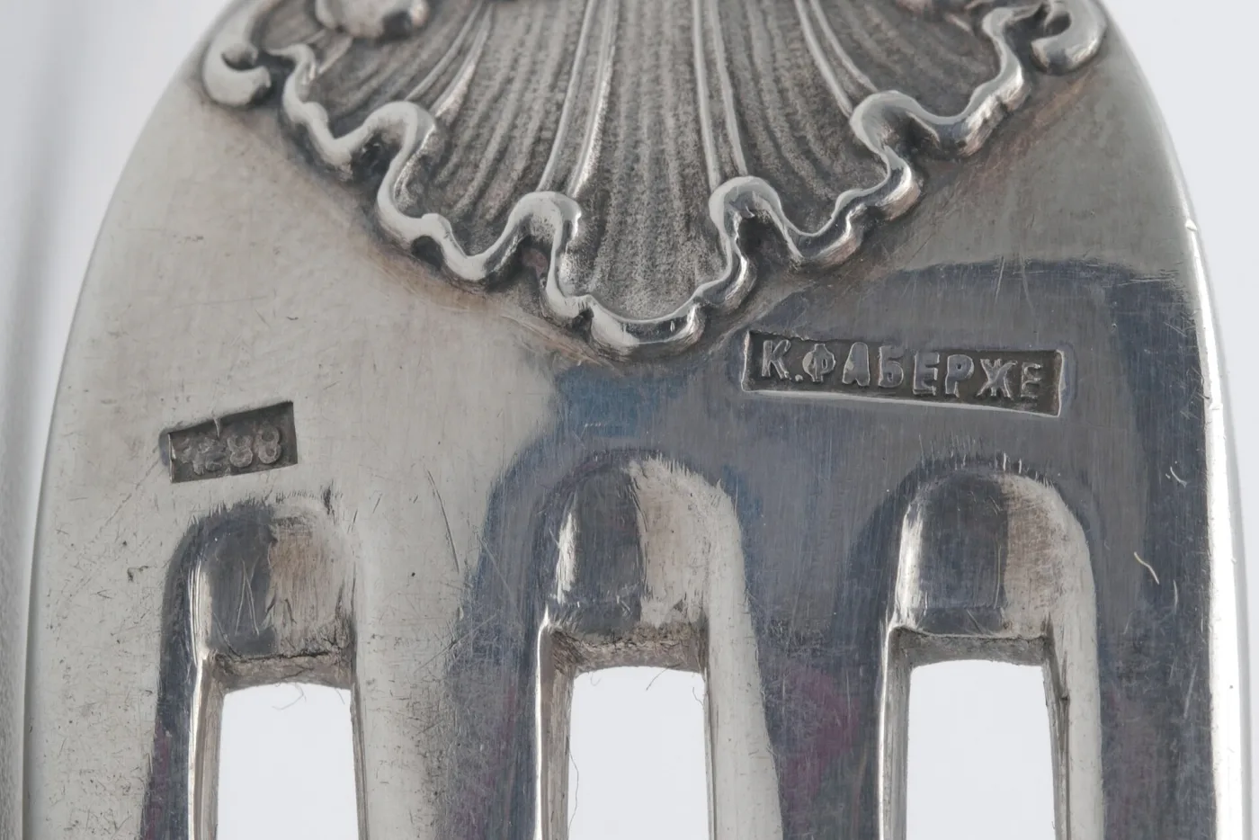 Russian silver fork marked with Cyrillic maker's name K Faberge and the numeral 88 zolotnik standard